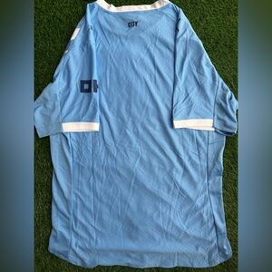 Man city player version jersey